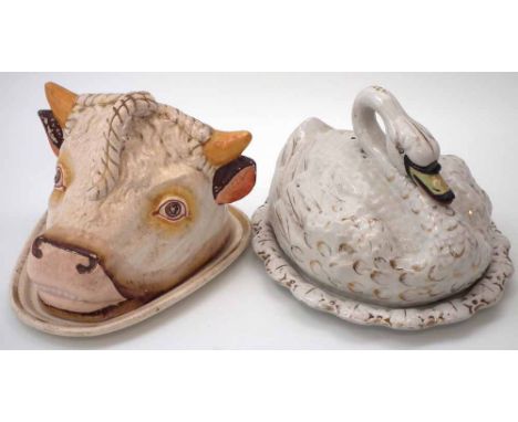 Staffordshire bull head cheese dish and cover, also a swan dish, late 19th century (4) the bull measures 16cm high     Condit