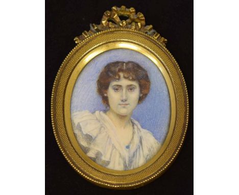 English School, early 19th century,   Portrait miniature of a lady, oval, watercolour on ivory, 6.5cm.; 2.5in high, set in a 