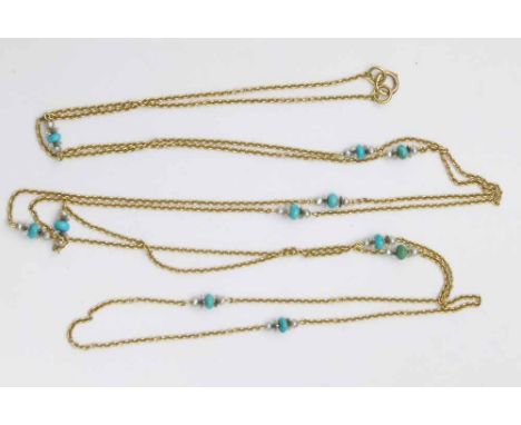 Unmarked gold muff chain set at intervals with tuquoise and seeed pearl beads, approximately 150cm, gross weight 18.0g.
 
Con