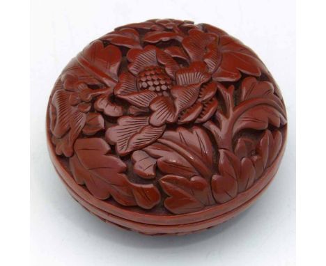 Chinese cinnabar lacquer compressed globular box and cover with copper mounts, carved with flowers, diameter 6cm
 
Condition 