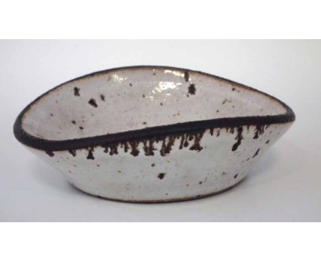 Lucie Rie (1902 - 1995) shallow studio pottery dish, impressed monogram to base, 13.5cm wide.     Artists` Resale Right (droi