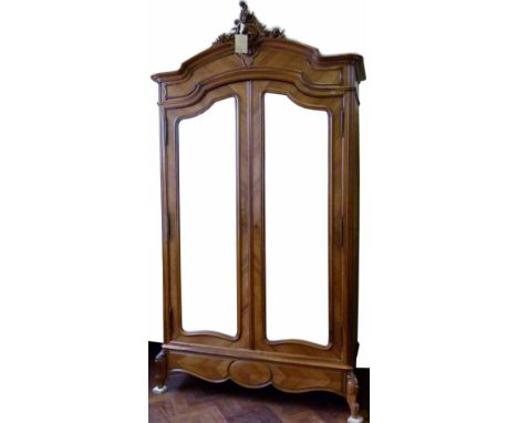 French walnut veneered armoire of two doors with bevelled plates, on leaf carved feet,m width 140cm.
 
Condition report: this