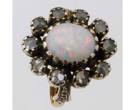 French opal oval cluster ring with rose cut diamonds, ring size P.