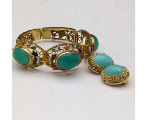 Chinese silver gilt and enamel bracelet set with green cabochon hard stones, marked "925"; also a pair of similar earclips.