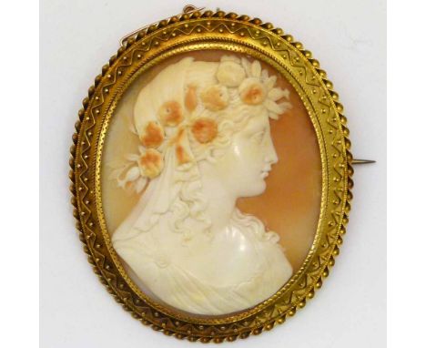 Large shell cameo brooch of a female profile, in an unmarked mount, overall length 67mm.
 
Condition report:crack upper left,