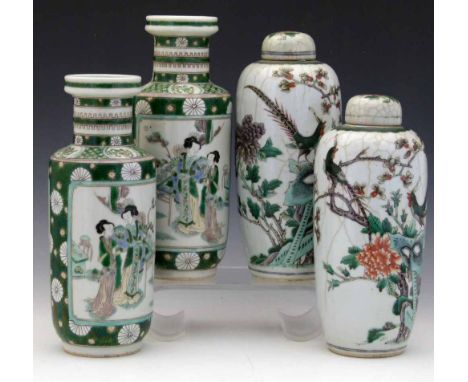 Pair of Chinese famille verte lidded vases, both painted with peacocks in a tree, Kangxi mark but later, height 25cm; a pair 