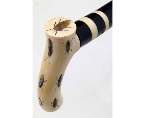 Japanese shibayama ebony walking stick, the ivory handle inlaid with various crawling insects, shaft length 90cm.
 
Condition