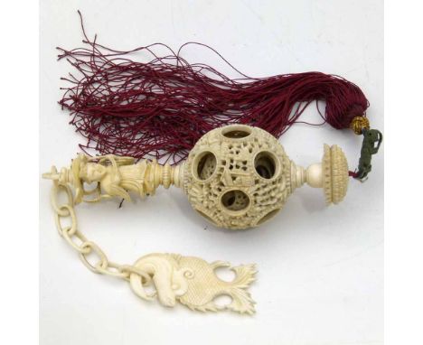 Chinese ivory puzzle ball of six concentric spheres, on an ivory chain, diameter 4.5cm.
 
Condition report: there are seven c