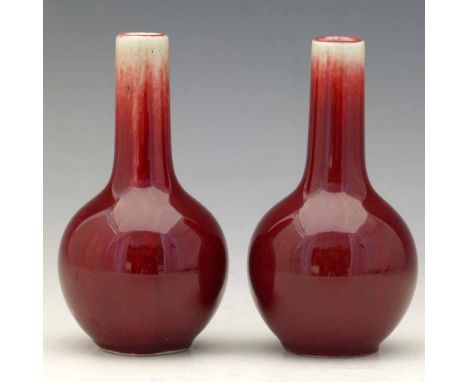 Pair of Chinese sange de boeuf glazed bottle vases, four character seal mark to base, height 12cm.
Condition report: no crack