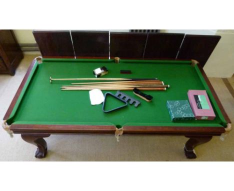 Riley quarter size snooker table with a dining table top, together with cues and balls.
 
Condition report: 117 x 225cm; pock