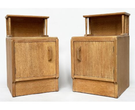 LAMP TABLES BY 'G PLAN', E. Gomme, a pair, mid 20th century oak each with raised shelf and panelled door, 36cm W x 63cm H x 3