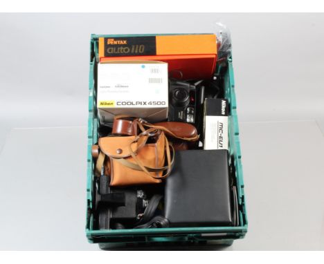 A Tray of Cameras and Related Items, including a Nikon Coolpix 4500, in maker's box, with battery, no charger, untested, a Pe