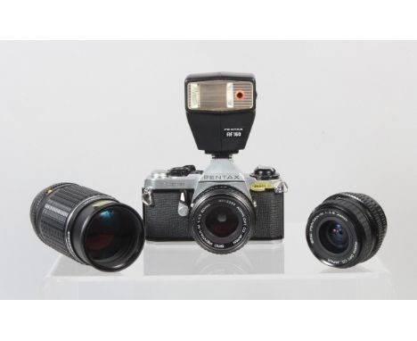 A Pentax ME Super SLR Camera, shutter working, meter responsive in auto/manual setting, self timer working, body G-VG, with S