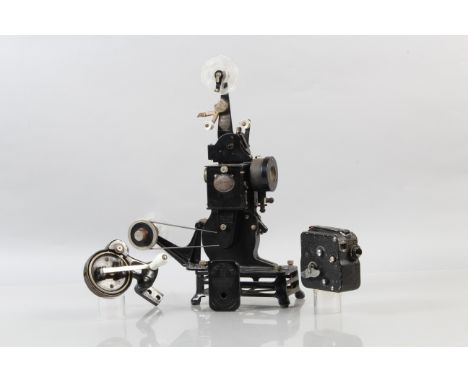 A PB-EX Pathéscope Super 9.5mm Cine Projector, mechanism appears jammed, missing glass, body G, no cine lens, with unrelated 