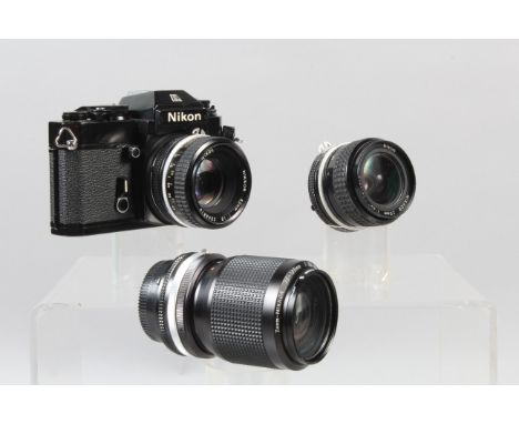 A Nikon EL2 SLR Camera, black, serial no 7940725, shutter working, meter responsive, self timer working, body G-VG, light wea