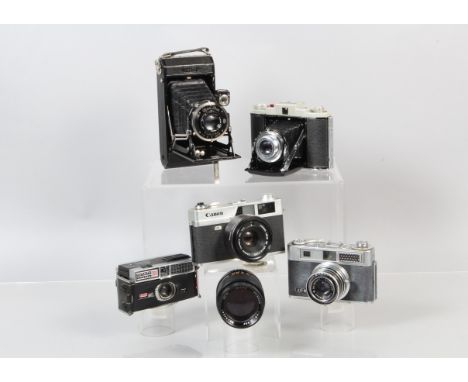 A Group of Cameras, a Canon Canonet QL-25, shutter not working, signs of battery leakage, body G, a Samoca LE-II, shutter sti