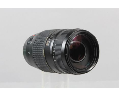 A Tamron AF 70-300mm f/4-5.6 Di LD Macro Lens, Canon EF mount, auto focus working, barrel VG, elements VG, with front/rear ca