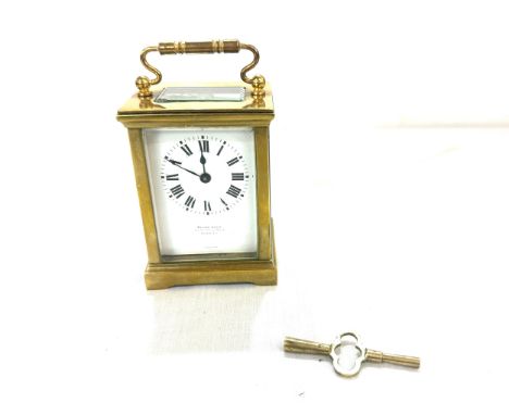 Brass Walter Jones carriage clock with key, working order, no warranty given 