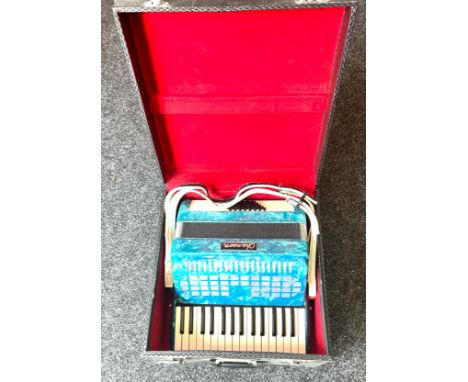 Cased chanoon accordion 