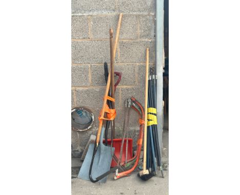 Large selection of assorted garden tools includes drain rods, spades, saws etc 