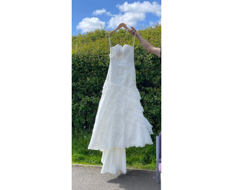 New ladies Wedding dress, retail stock clearance ( may have marks or very light damage) no size but roughly a size 6/8 