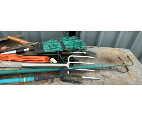 Selection garden tools to include hedge trimmer, spade, hoe, garden sprayers etc - Table not included 