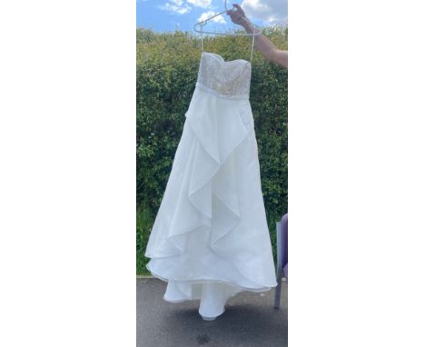 New ladies Wedding dress, retail stock clearance ( may have marks or very light damage) no size but roughly a size 6/8 