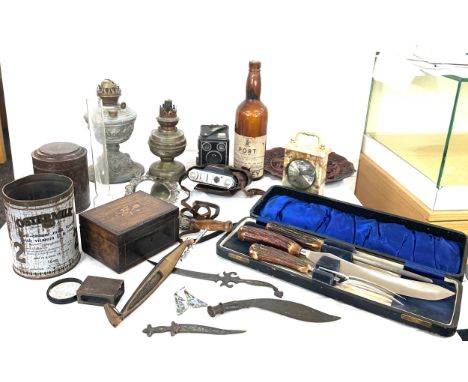 Box of miscellaneous items to include oil lamps, mirror, clock, tea caddy etc 