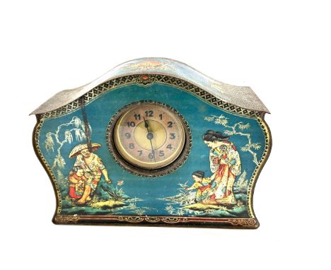 Vintage advertising tin mantle clock, 10 inches tall 13 inches wide 