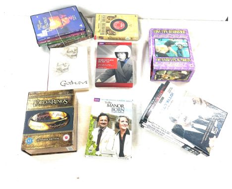 Selection of assorted box sets of DVD's to include Lord of the Rings, Love my neighbour etc 
