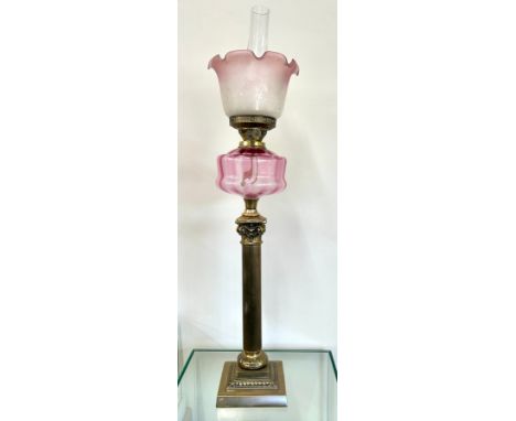 Vintage Cranberry and brass column style oil lamp with shade and funnel, approximate overall height 34 inches, measurements o