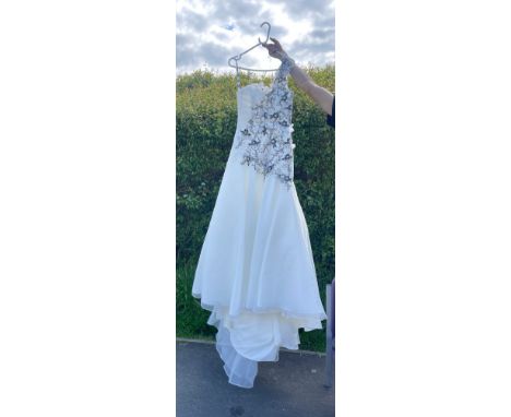 New ladies Wedding dress, retail stock clearance ( may have marks or very light damage) no size but roughly a size 10 by Amal