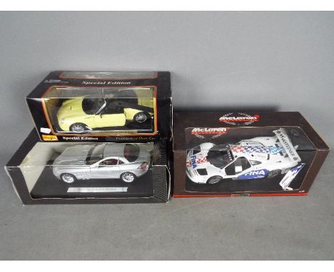 Maisto - UT - 3 x 1:18 scale cars including Ford Thunderbird Show Car, Mercedes McLaren SLR, McLaren F1 GTR. Two of the cars 