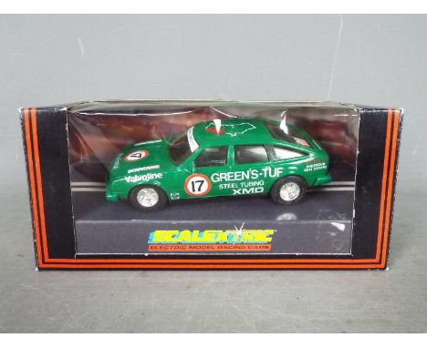 Scalextric - Rover 3500 V8 # C141 in Green's Tuf livery, this car shows light signs of use and comes in an associated period 