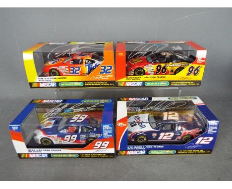 Scalextric - 4 x Ford Taurus Nascar models including # C2346 in Tide livery, # C2371 in Citgo livery, # C2348 in Mobil livery