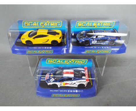 Scalextric - 3 x McLaren 12 C slot cars # C3278 in yellow, # C3505 Gemballa Racing in blue, # C3503 Sebastian Loeb car. All t