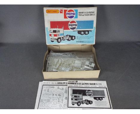 Matchbox, AMT - A boxed Matchbox AMT PK-7103 1:43 scale plastic model truck kit. The kit has parts on sprues and loose parts 