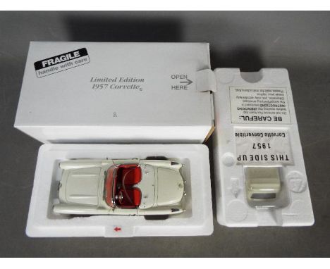 Danbury Mint - Limited edition 1957 Chevrolet Corvette in 1:24 scale. The car appears Mint but is a little dusty from display