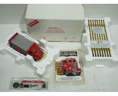 Danbury Mint - 1938 GMC CoE Coke Cola Delivery Truck. The model appears Mint but is very dusty from being on display and woul