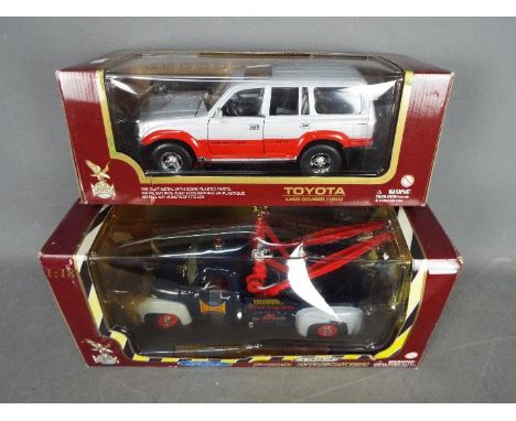 Road Legends -  2 x 1:18 scale vehicles, 1992 Toyota Land Cruiser # 92098 in silver over red, 1953 Ford F-100 Wrecker in blue