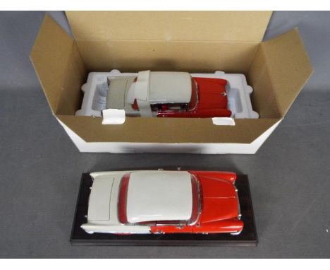 Danbury Mint - 2 x 1:16 scale 1955 Chevrolet Bel Air models, both have some damage, the boxed car has cracks in the body and 