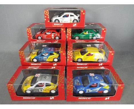 Ninco - 7 x Renault Maxi Megane Rally cars in various liveries. # 50145 in red, # 50147 in yellow, # 50146 in green and simil