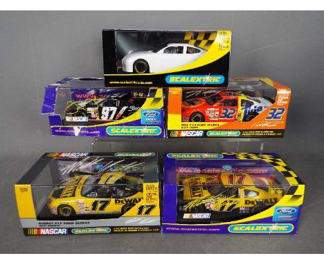 Scalextric - 5 x Ford Taurus Nascar models including # C2594 in De Walt livery, # C2435TF in plain white, # C2419 in Tide liv