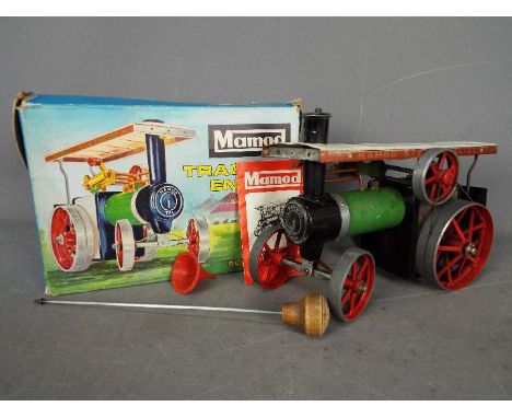 Mamod - A boxed Mamod TE1a Steam Traction Engine. The model complete with burner, steering rod, and funnel appears to be in F