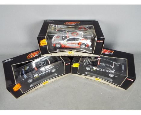 Maisto - 3 x Mercedes Benz CLK DTM cars in 1:18 scale in Warsteiner livery, Vodafone livery and AMG livery. All three cars ap