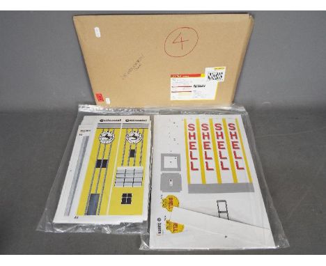 Bauer - Two printed and pre-cut cardboard building kits suitable for slot car layouts. Lot includes Bauer Nuburgring Continen