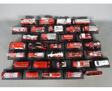 Del Prado - A brigade of over 30 unboxed Del Prado diecast Fire Appliances. Lot includes Seagrave 1:64 K-Type pumper; 1:72 FM