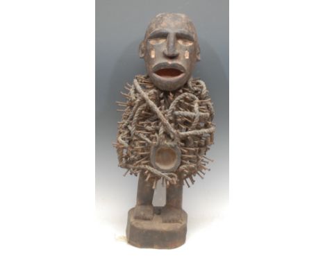 Tribal Art - a Kongo Nkisi/Nkondi fetish figure, painted features, typically adorned with iron nails, 54cm high, Democratic R