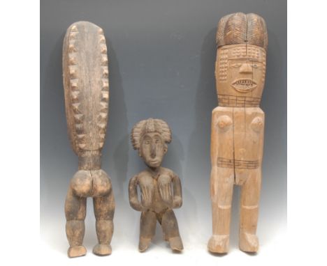 Tribal Art - a Baule maternity figure, 38cm high, Ivory Coast; other figures, larger (3)