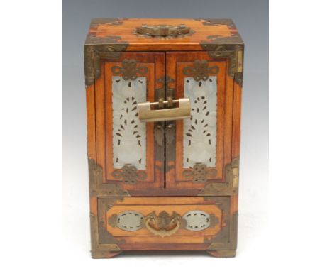 A Japanese brass mounted jewellery box/collector's cabinet, set with carved jade panels, pair of hinged doors, opening to rev